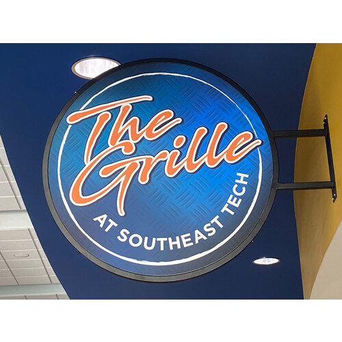 Round illuminated blade sign for The Grille